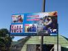 Ein Plakat bewirbt SOS-Kinderdorf in Leribe.